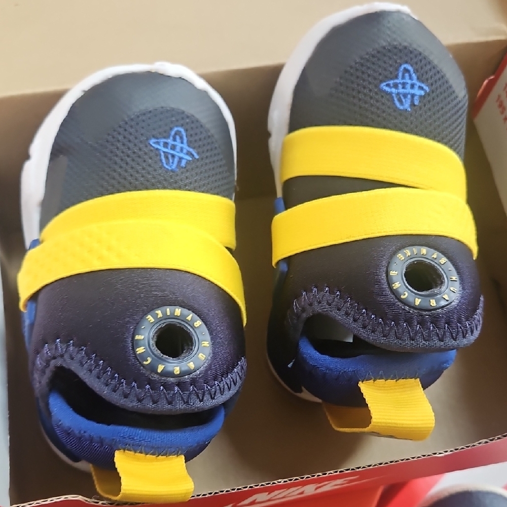 Nike Kids' Black and Yellow Sneakers with Blue Accents